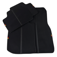 Black Floor Mats for BMW 1 Series E87 (2004-2013) installed in vehicle, showcasing premium design and perfect fit.