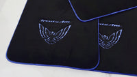 Black Floor Mats with Blue Trim for Pontiac Third Generation FireBird (1982-1992) with Trans Am Logo